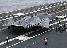 Airplane Picture - F/A-37 Talon mockup on the flight deck of the USS Abraham Lincoln, CVN-72 commissioned 1989
