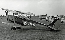 Airplane Picture - Tiger Moth Coupe with spatted undercarriage at Coventry Airport in 1955