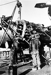 Airplane Pictures - Nuthampstead, England. Aircraft mechanics with the 398th Bombardment Group change a B-17 Flying Fortress engine. During the group's stay in England from May 1944 to April 1945, the 398th flew 195 missions and lost 292 men and 70 B-17 aircraft in combat