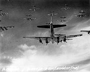 Airplane Pictures - Over Germany, B-17 Flying Fortresses from the 398th Bombardment Group fly a bombing run to Neumnster, Germany, on 13 April 1945