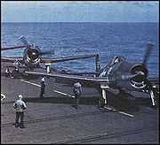 Airplane Pictures - Grumman F6F-3 Hellcats in tricolor scheme on the flight deck